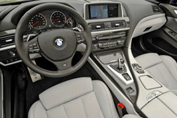 Девушка тестирует BMW 6 series Coupe 2011 BMW 6 серия F12-F13